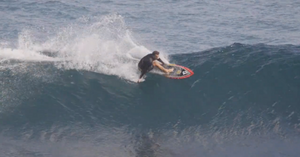 Enter The Gateway. Ozzy surfing a couple of boards by Joel Fitzgerald